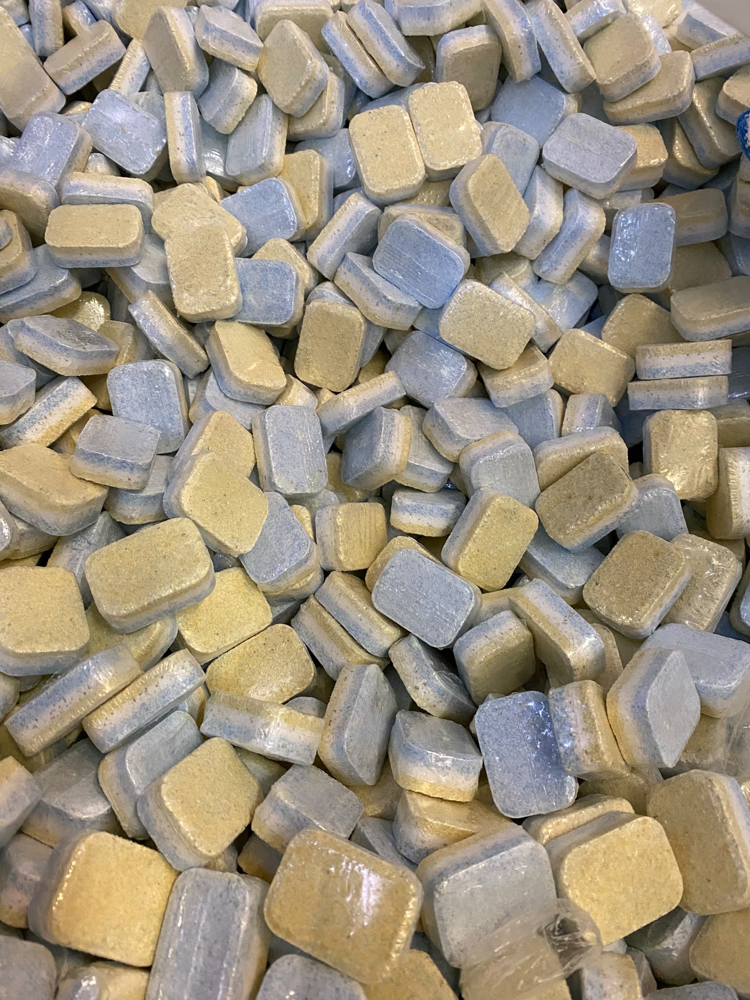 Loose 3-layer dishwasher tablets in a big bag